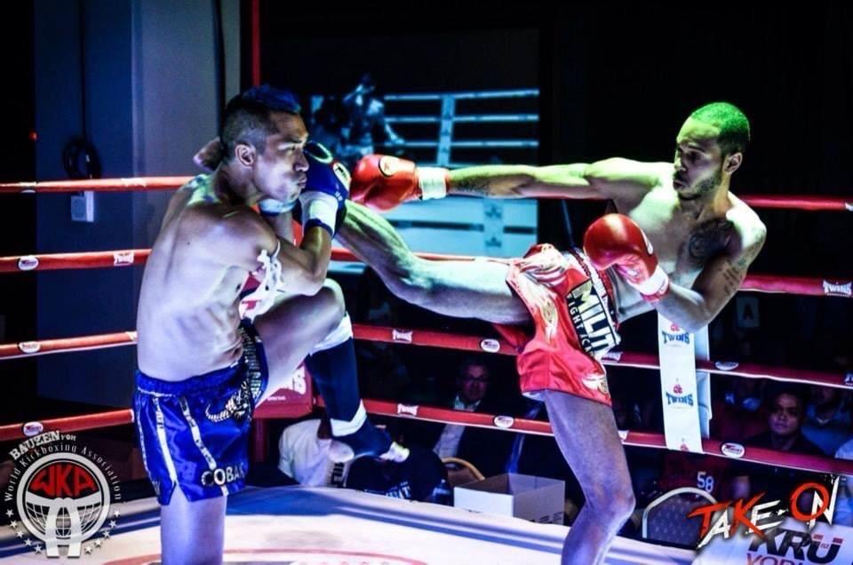 Right body kick in-ring action